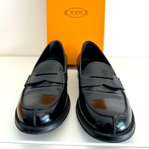 Tod’s black leather penny loafers size 8